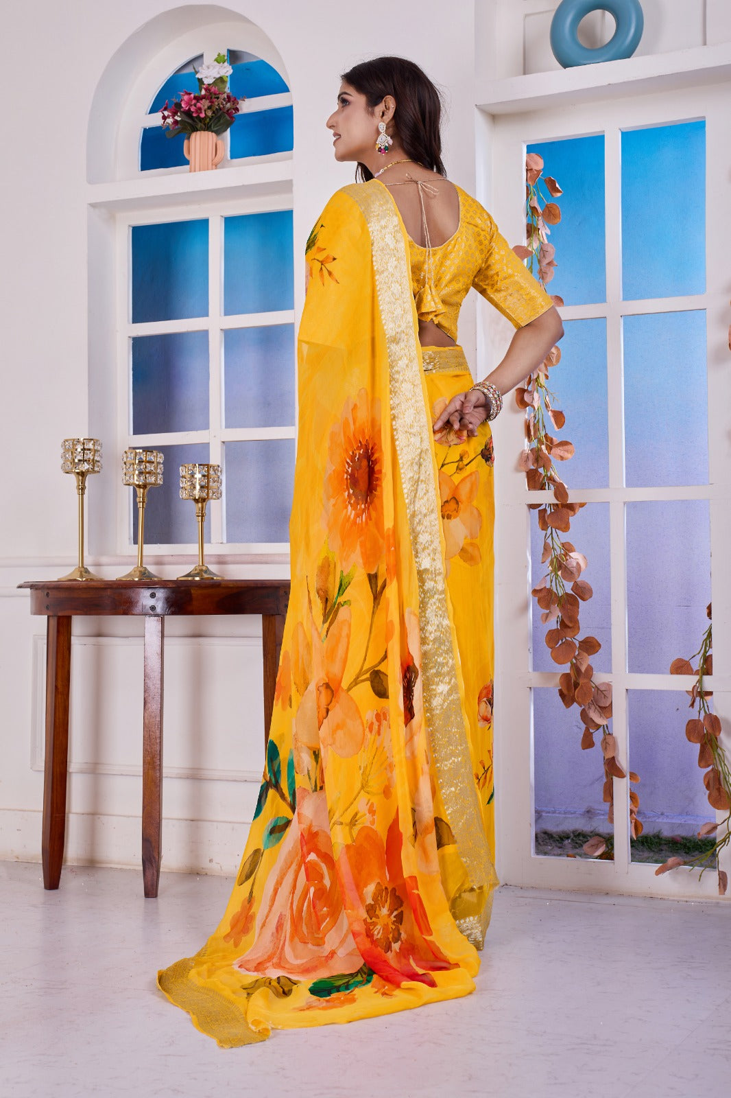 Troika Fashion – Yellow Chiffon Floral Print Saree with Golden Border