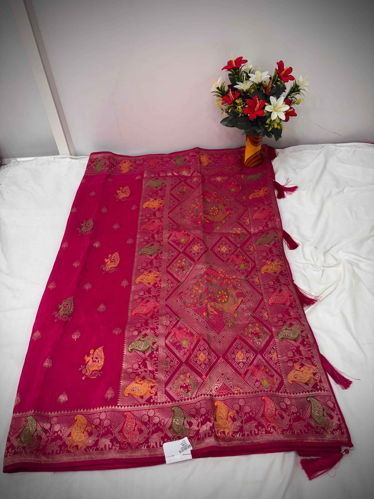 Elevate Your Festive Wardrobe with the Rani Pink Silk Saree