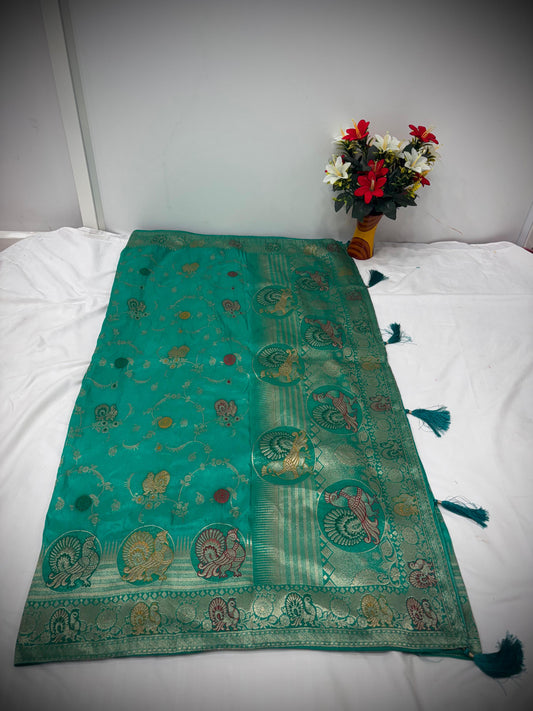 Troika Fashion – Elegant Green Satin Saree with Multicolor Zari Peacock Motifs & Festive Borders