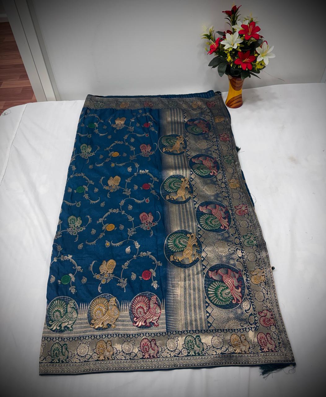 Troika Fashion – Elegant Green Satin Saree with Multicolor Zari Peacock Motifs & Festive Borders