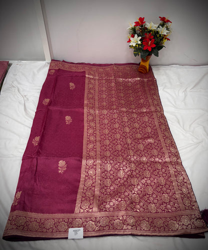 Troika Fashion – Maroon Dola Silk Saree with Golden Zari Floral Weaving & Classic Borders