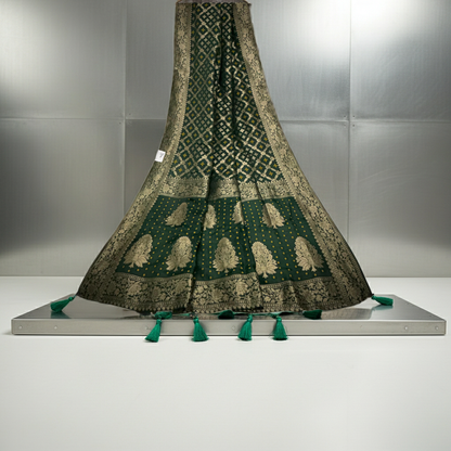 Troika Fashion – Dark Green Dola Silk Saree with Golden Mina Work & Elegant Woven Patterns