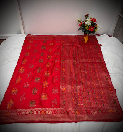 Troika Fashion – Vibrant Red Satin Saree with Multicolor Zari Weaving & Festive Motifs